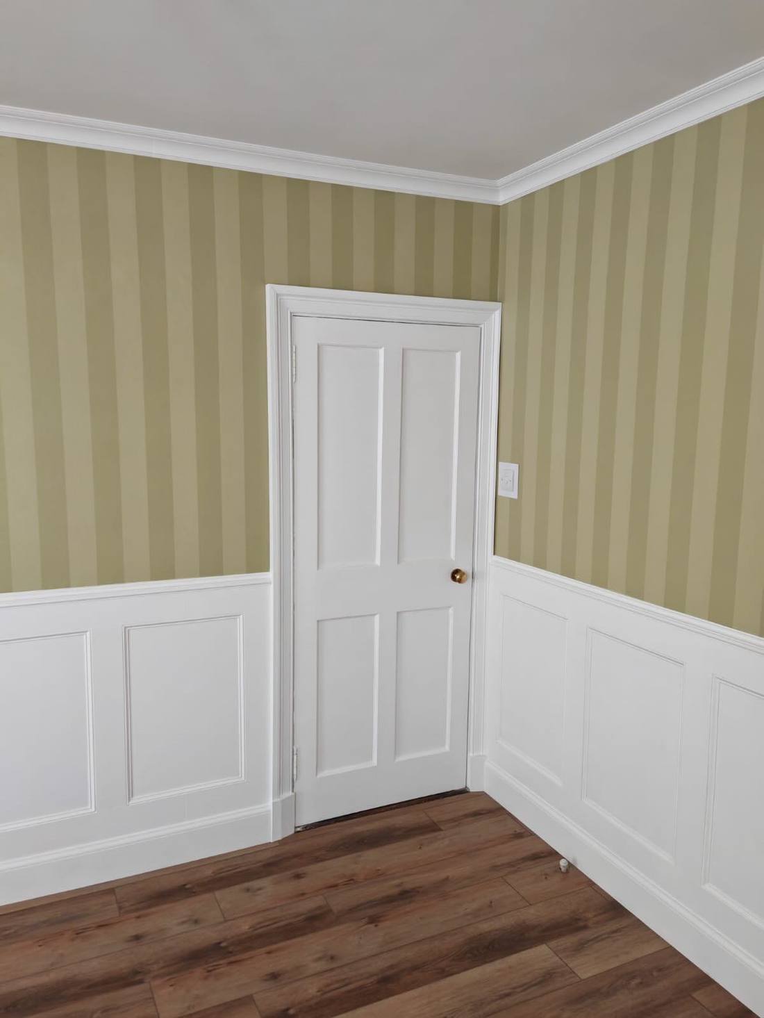 Panelled dining room with new internal door and skirtings