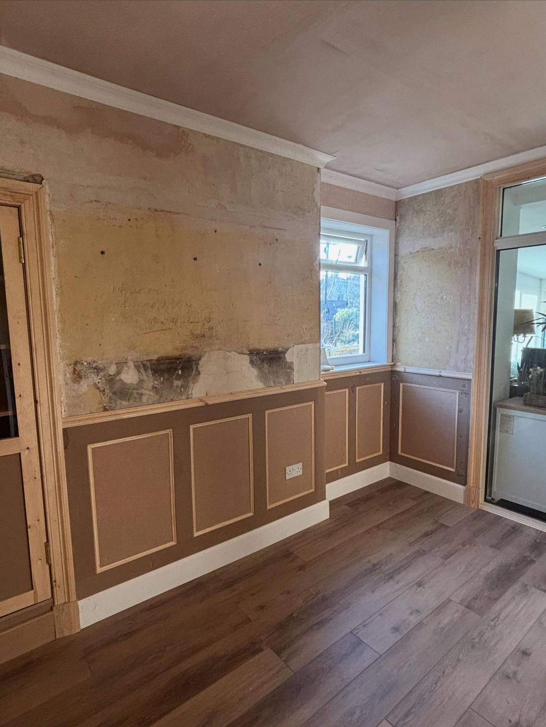 Wall panelling being fitted during the dining room refit