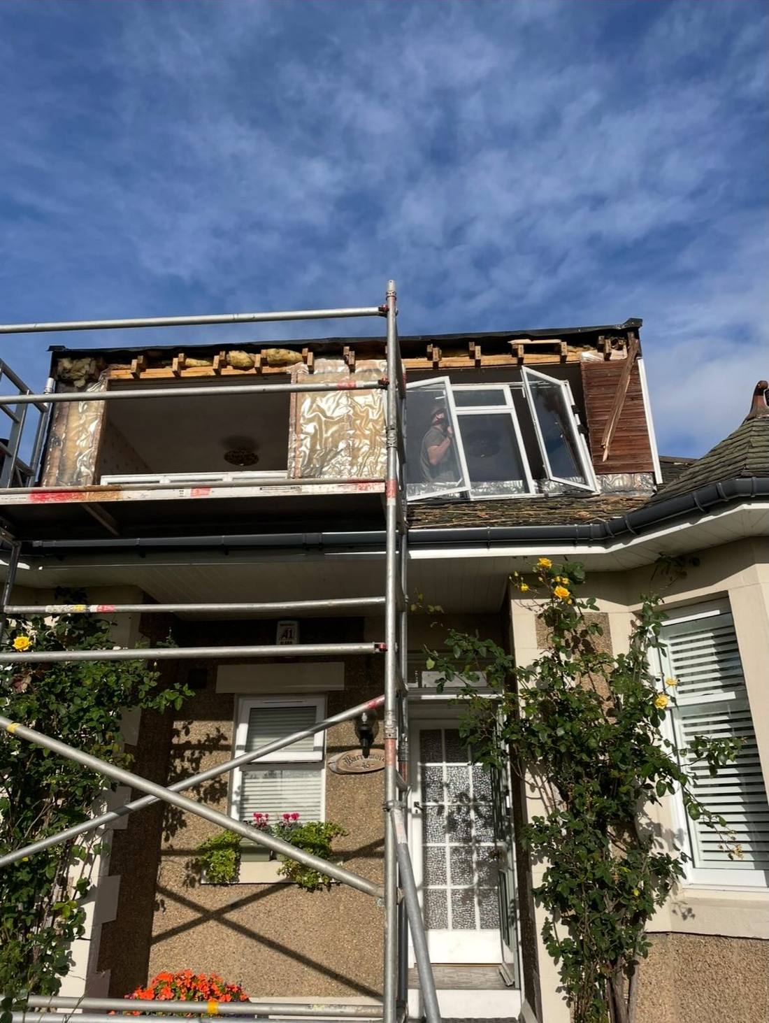 Dormer stripped back with scaffolding up during the rebuild
