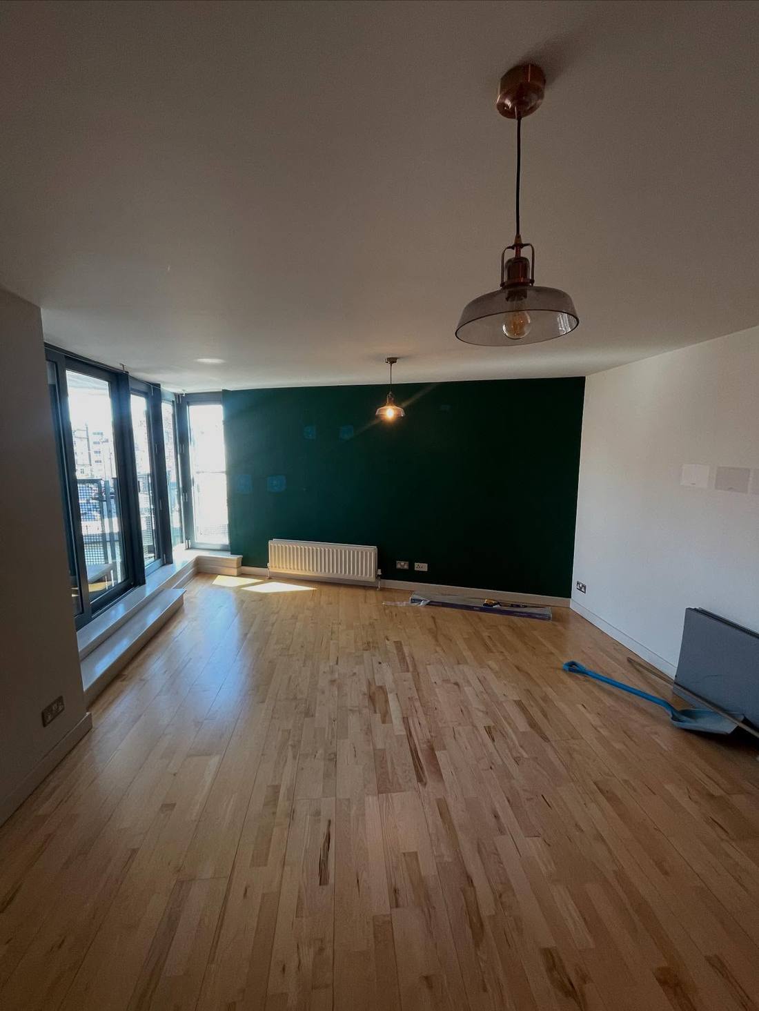 Finished living room with new wood flooring